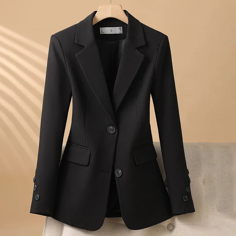 Elegant women's fashion blazer, a tailored jacket perfect for workwear. Structured fit and chic design for modern women.