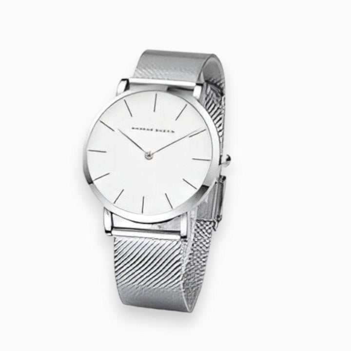 Elegant women's titanium wristwatch in silver, gold, or rose gold. Water-resistant & durable design.
