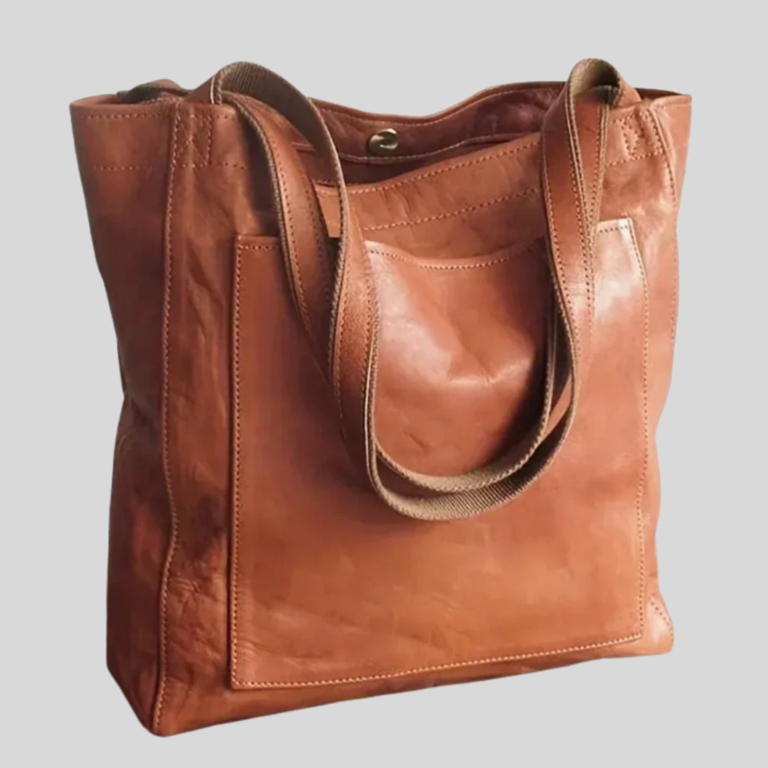 Chic women's tote bag with versatile shoulder strap. Elegant fashion purse for everyday carry.
