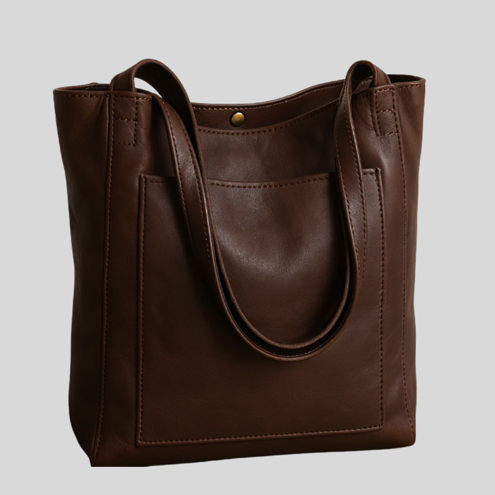 Stylish women's tote bag designed for everyday carry, featuring a versatile and comfortable shoulder strap.