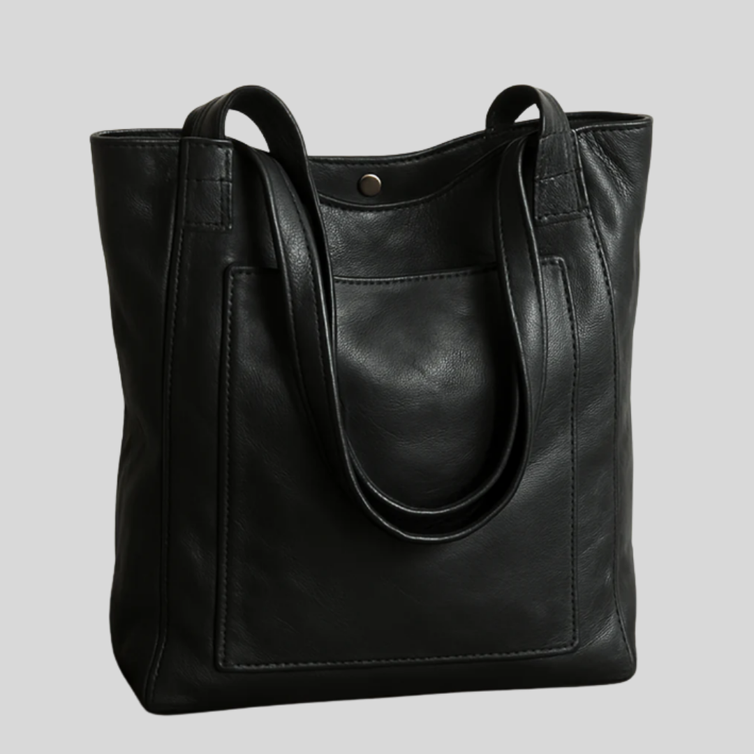 Fashionable women's tote bag with adjustable shoulder strap & organized storage, a versatile chic accessory.