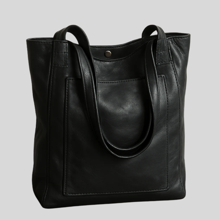 Fashionable women's tote bag with adjustable shoulder strap & organized storage, a versatile chic accessory.