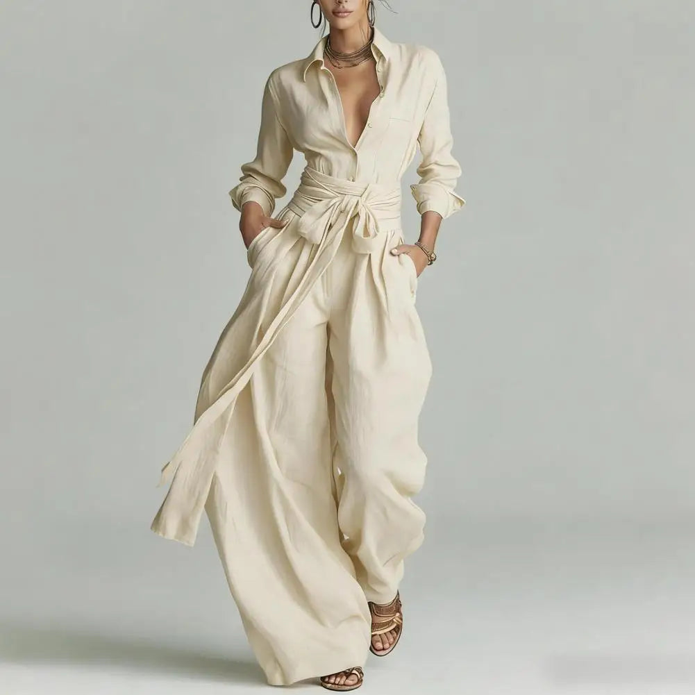 Chic women's two-piece co-ord set featuring a button-down shirt & wide-leg pants for elegant, relaxed style.