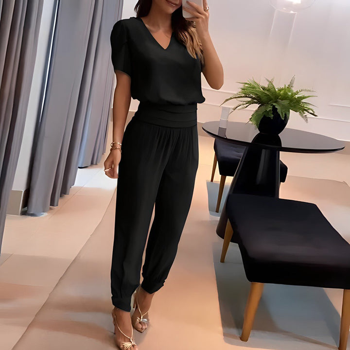 Stylish women's matching two-piece set. Features a chic puff sleeve top & comfortable bottom for women.