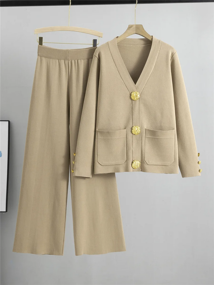 Versatile women's two-piece outfit with delicate gold trim detailing. A chic and comfortable ensemble for modern women.