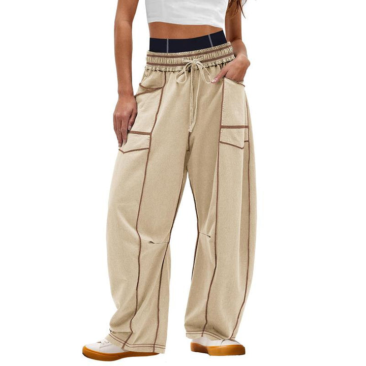 Fashionable women's barrel pants with a utility design, ideal for a contemporary look.