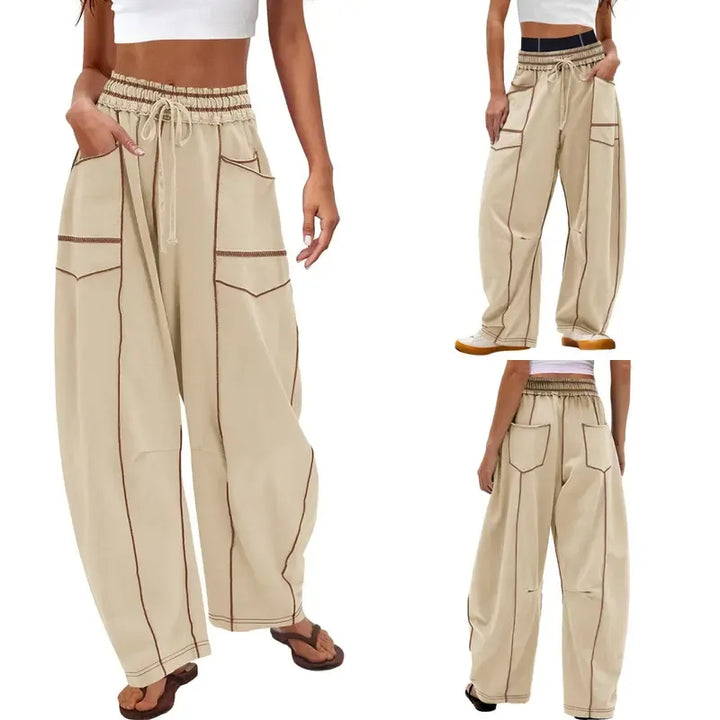 Modern women's barrel leg pants with utility pockets, perfect for a sophisticated casual outfit.