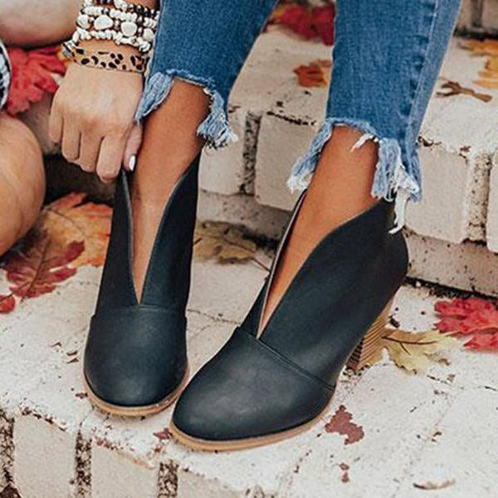 Stylish women's comfortable ankle boots, perfect for fall fashion. Versatile V-cut design for chic casual looks.