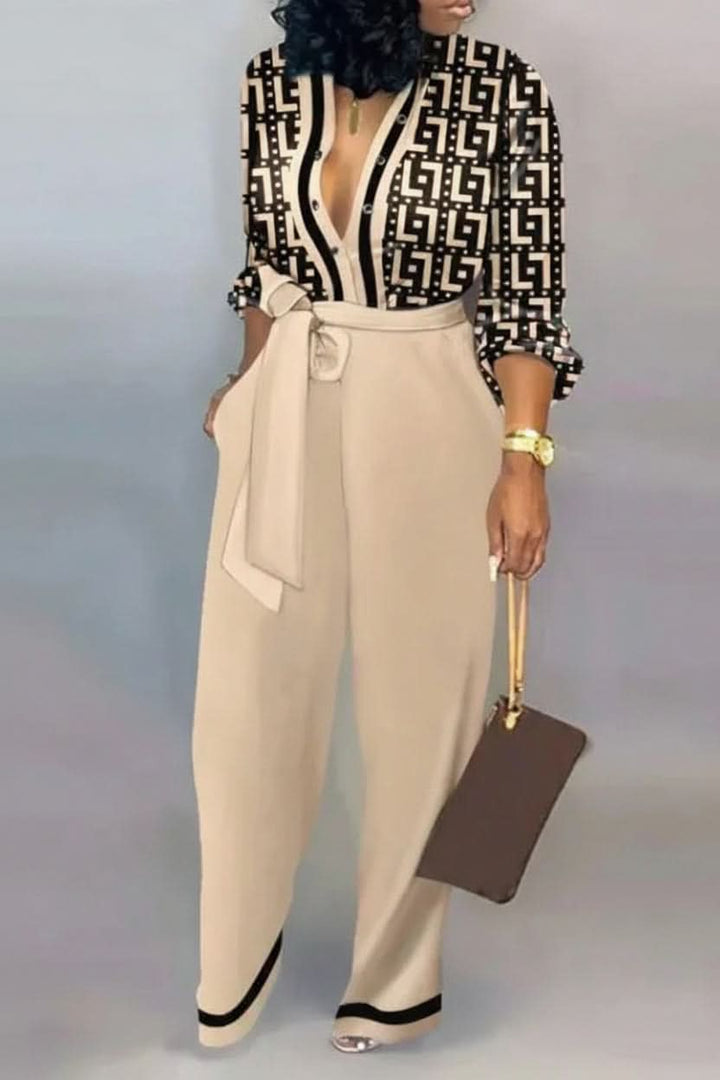 Chic women's V-neck jumpsuit, perfect for elegant casual or formal wear. Comfortable and stylish one-piece outfit.
