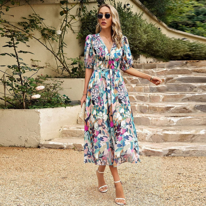 Chic women's V-neck midi summer dress. Flowy fabric, short sleeves, elegant yet casual. Perfect for warm weather outfits.