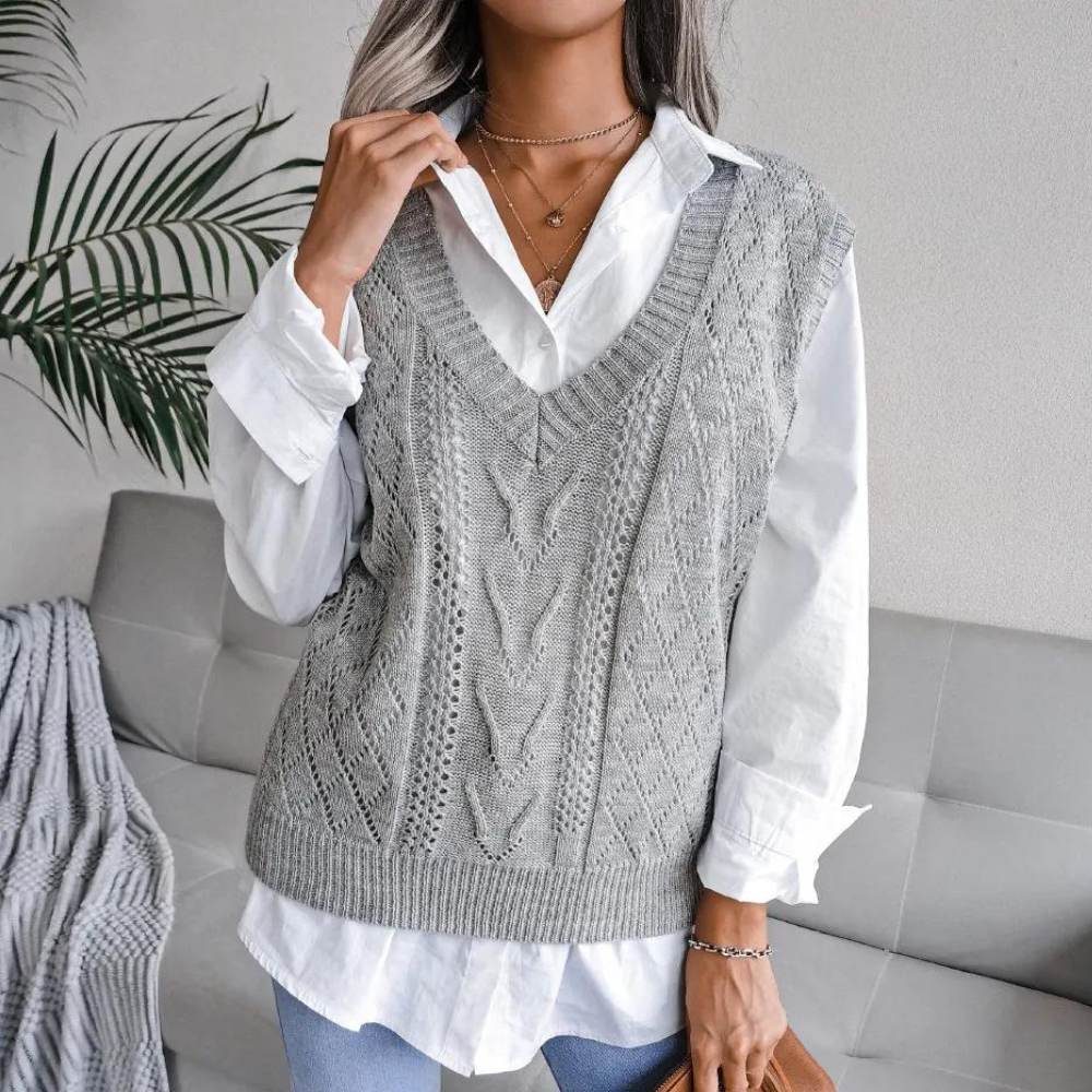 V-neck sweater vest for women. Versatile sleeveless top, ideal for chic fashion and comfortable layering.