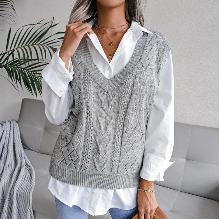 V-neck sweater vest for women. Versatile sleeveless top, ideal for chic fashion and comfortable layering.