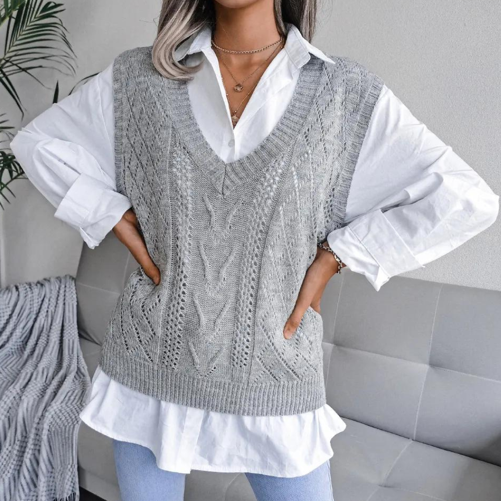 Modern women's V-neck sweater vest, a chic layering essential. Stylish sleeveless knit for comfortable wear.