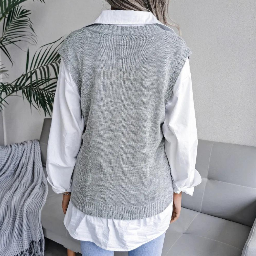 Comfortable women's V-neck sweater vest. Stylish layering top for chic fashion and versatile daily wear.