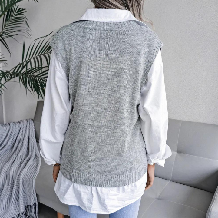 Comfortable women's V-neck sweater vest. Stylish layering top for chic fashion and versatile daily wear.