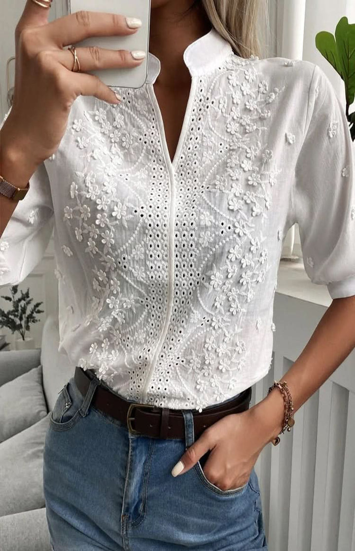 Elegant women's V-neck blouse, a chic and versatile short-sleeve top for any occasion.