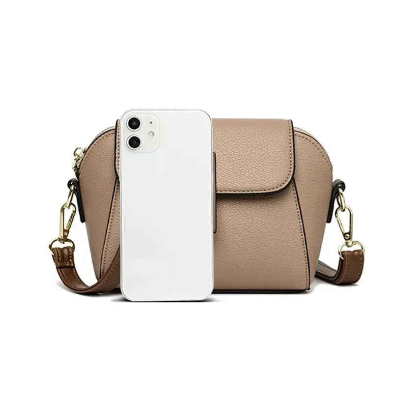 Premium faux leather small handbag, a durable & stylish women's accessory.