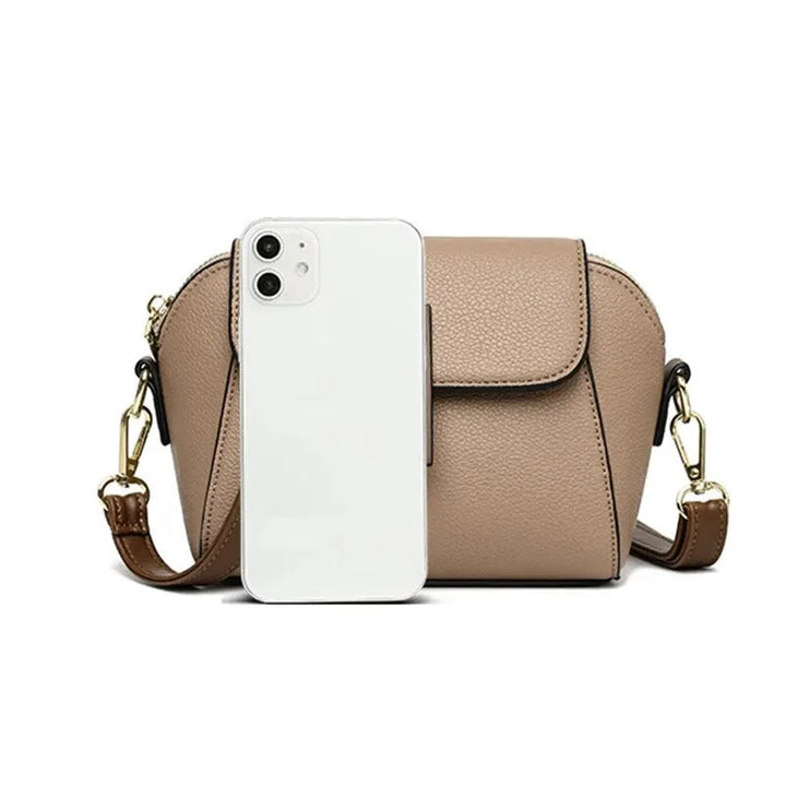 Premium faux leather small handbag, a durable & stylish women's accessory.