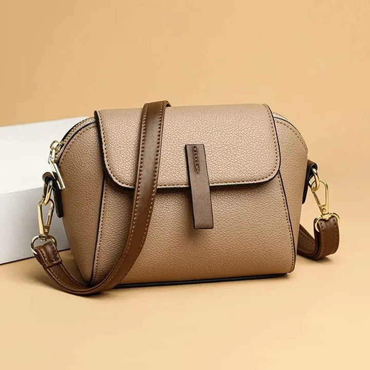 Stylish faux leather compact purse, perfect for everyday essentials.