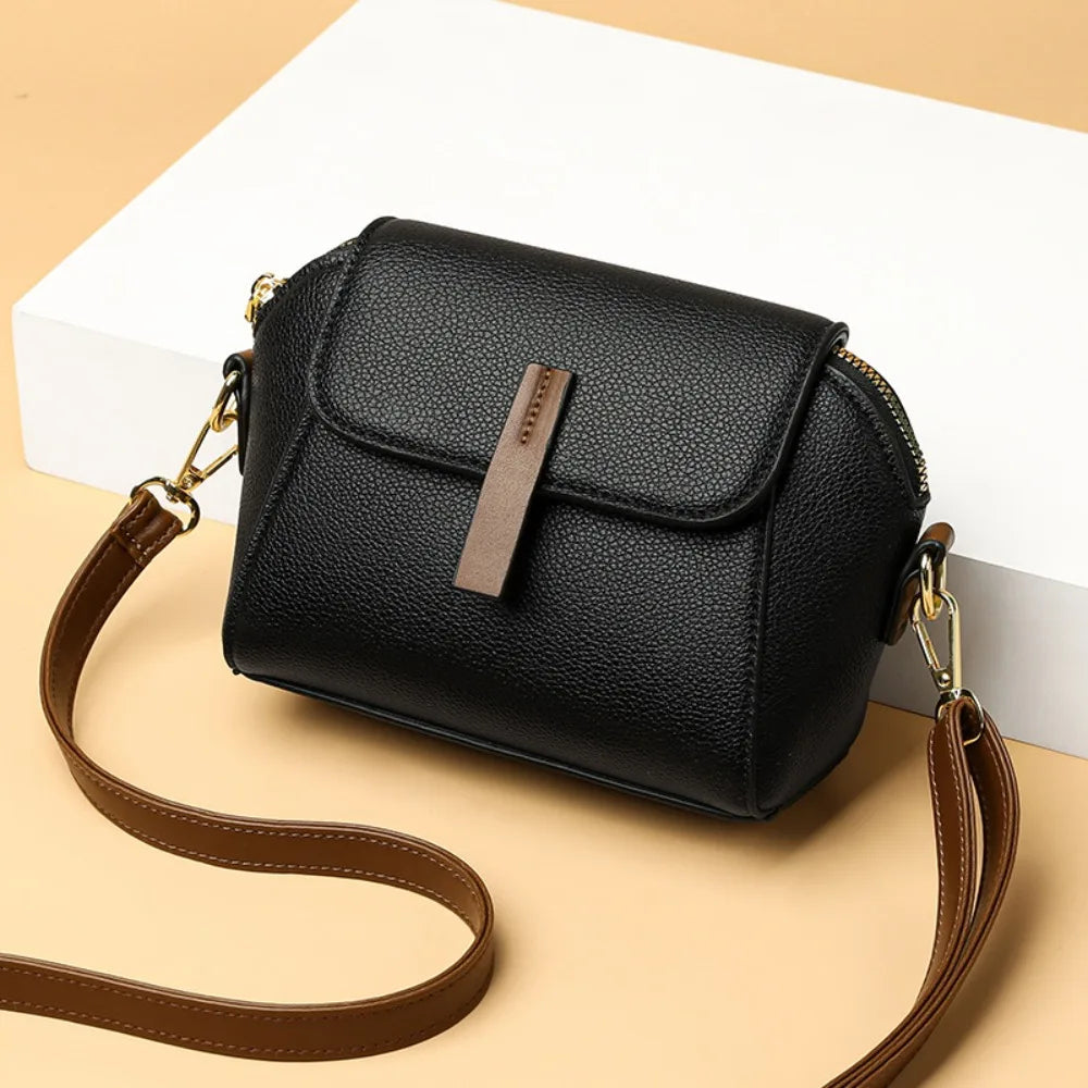 Women's small handbag, a fashionable vegan leather shoulder bag.