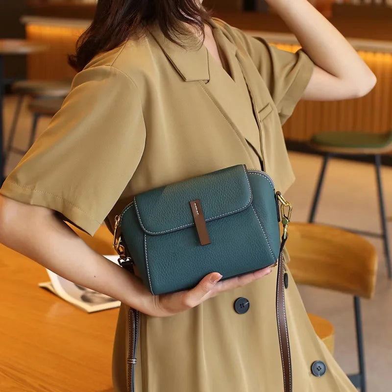 Fashionable women's mini bag, a stylish vegan leather compact purse.