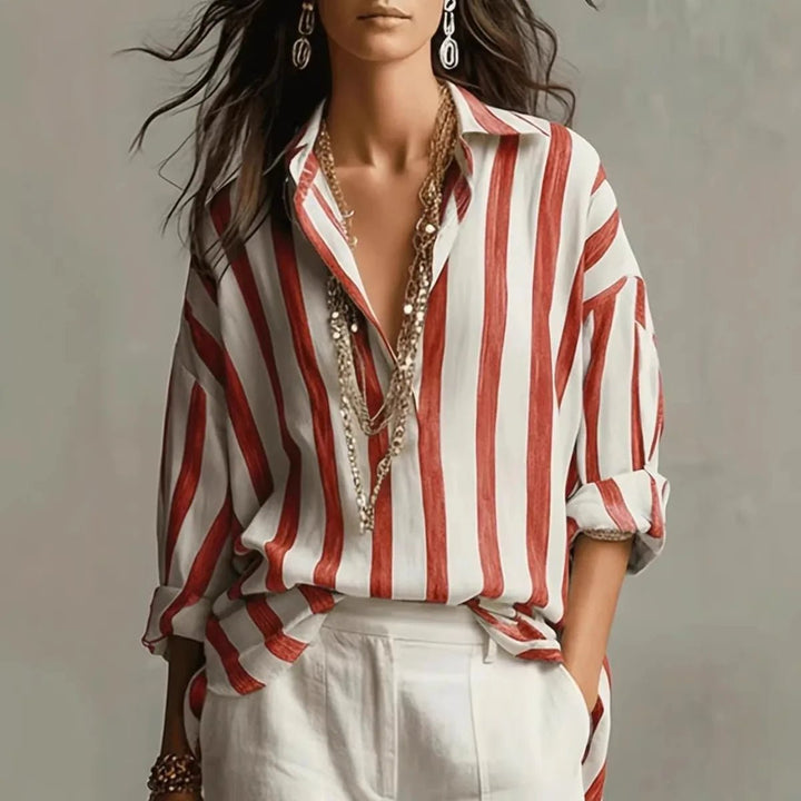 Fashionable women's open collar blouse featuring a classic vertical stripe pattern for a chic, versatile look.