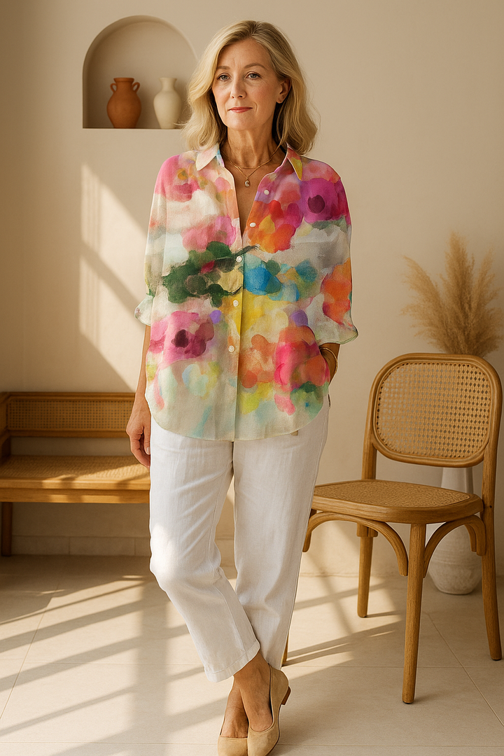 Elegant women's long sleeve watercolor blouse, vibrant floral print. Multicolor artistic top, chic casual statement piece.