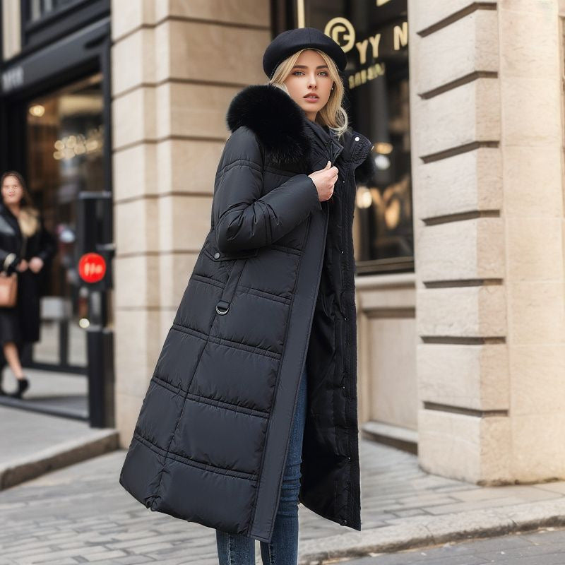 Warm and elegant women's outerwear: a tailored winter coat with a sophisticated removable hood.