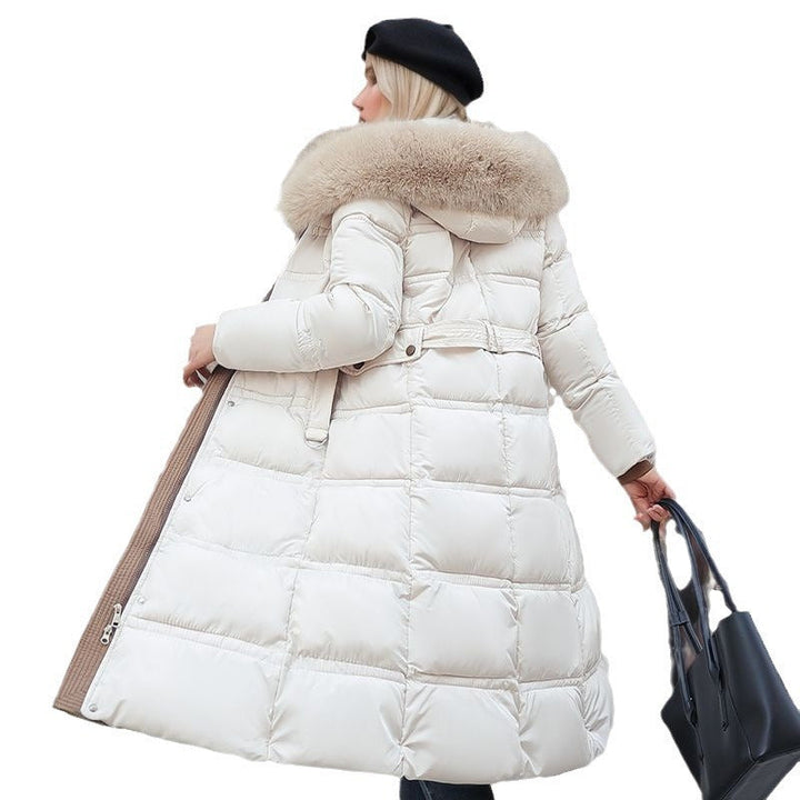 Elegant women's coat for autumn & winter, offering chic style and a practical removable hood.