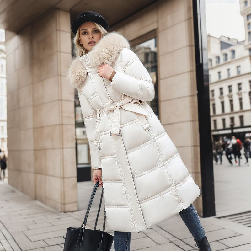Fashionable women's winter coat, designed for warmth and sophistication, with a removable hood.