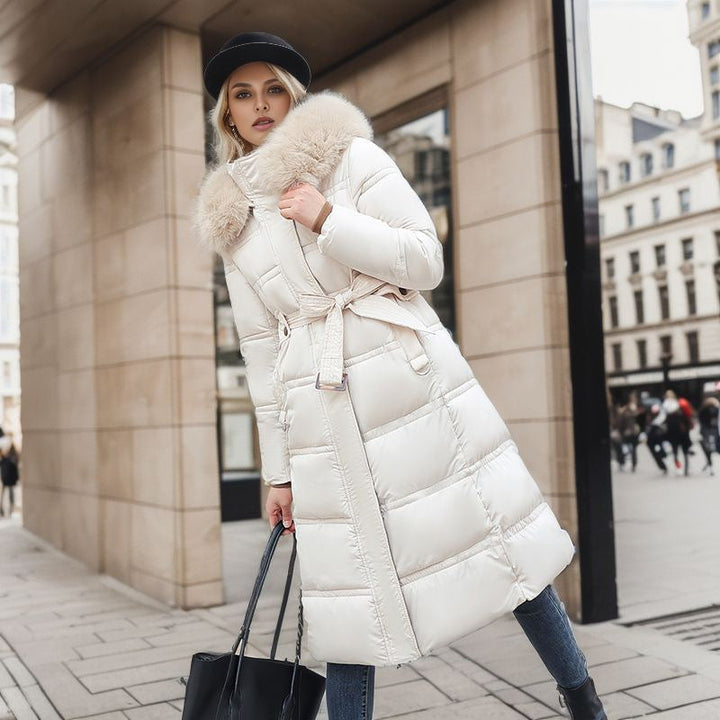 Fashionable women's winter coat, designed for warmth and sophistication, with a removable hood.