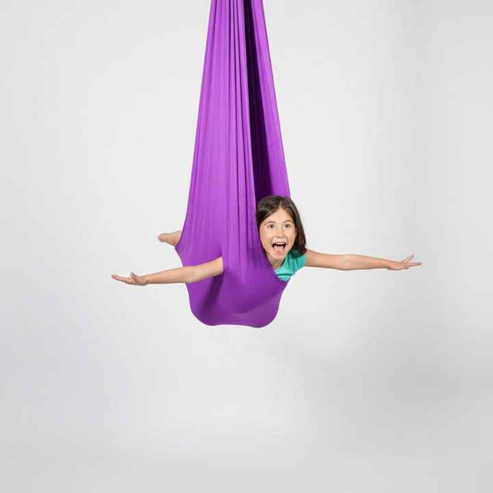 Sensory swing for kids care, shown in a playroom, providing a safe space for focus and relaxation.