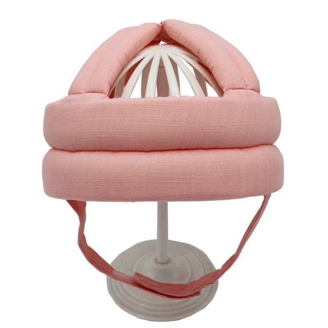 Prevent bumps & bruises with this soft baby head protection helmet. Adjustable child safety cap.