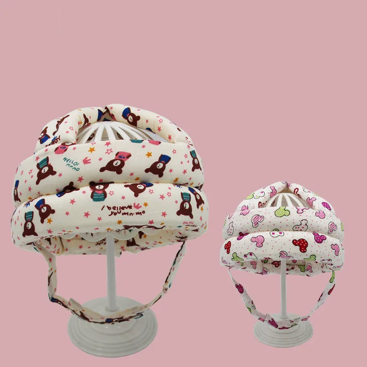 Infant helmet for crawling and walking safety. Soft protective headgear for toddlers learning to stand.