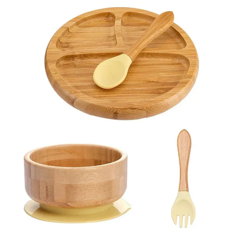 Weaning starter kit: bamboo suction plate, bowl, and soft silicone tip spoon for babies.