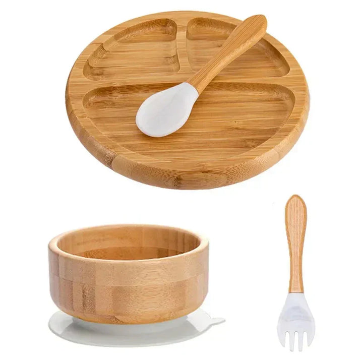 Mess-free baby weaning set: bamboo plate, bowl, spoon with suction cup, hassle-free.