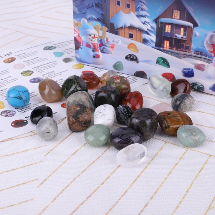 Excavation tools & real gemstones from a children's advent calendar. Engaging science discovery kit.