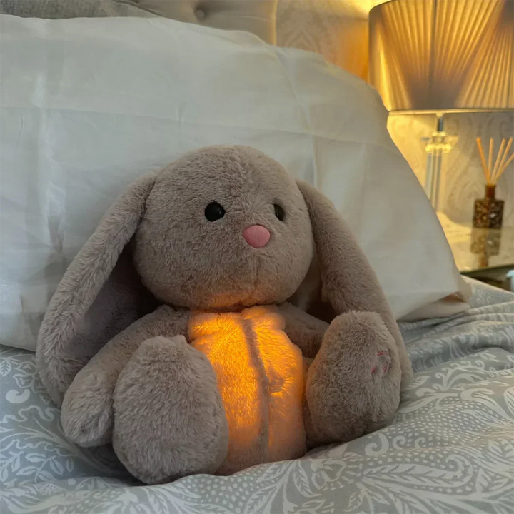 Children's soothing breathing plush, a calming sleep aid & anti-anxiety comfort toy for peaceful bedtime.