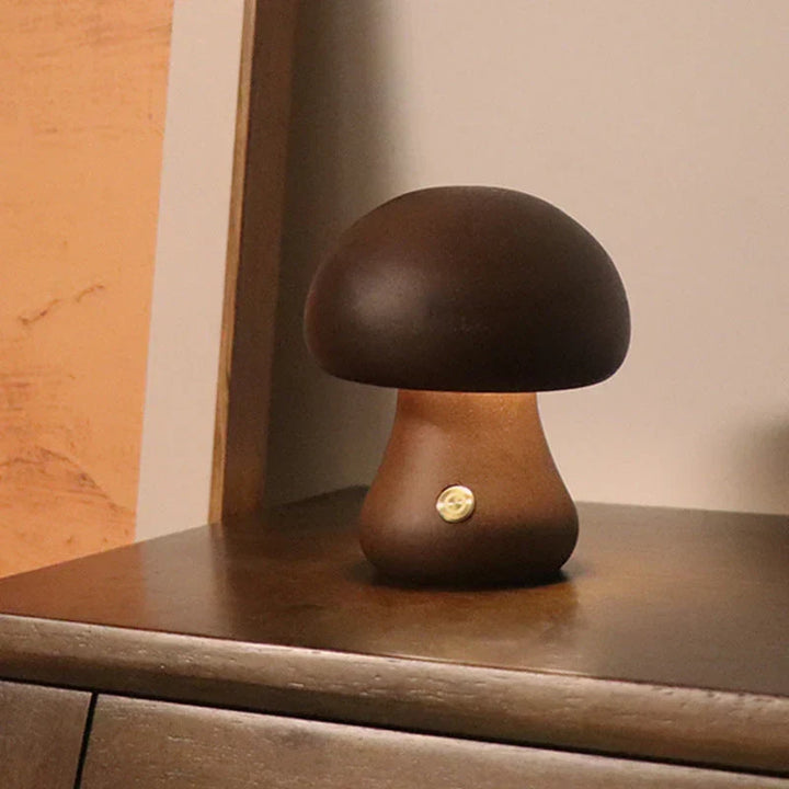 Children's wooden mushroom LED night light, GlowShroom, for a warm glow in kids' bedrooms.