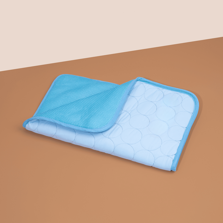 ChillComfort light blue dog mat with 4x cooling power, designed for ultimate comfort & summer relief.