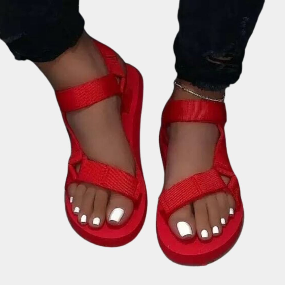 Pair of Chloe women's color block sandals on a white background, top view