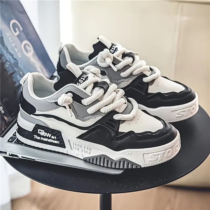 Beige chunky men's streetwear sneakers, featuring a bold design and comfortable tread sole for urban style.