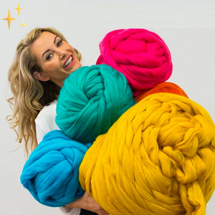 Thick, soft chunky yarn ideal for arm knitting DIY blankets, throws, and home decor.