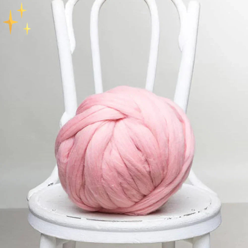 Close-up of chunky wool yarn fibers, emphasizing its softness and quality.