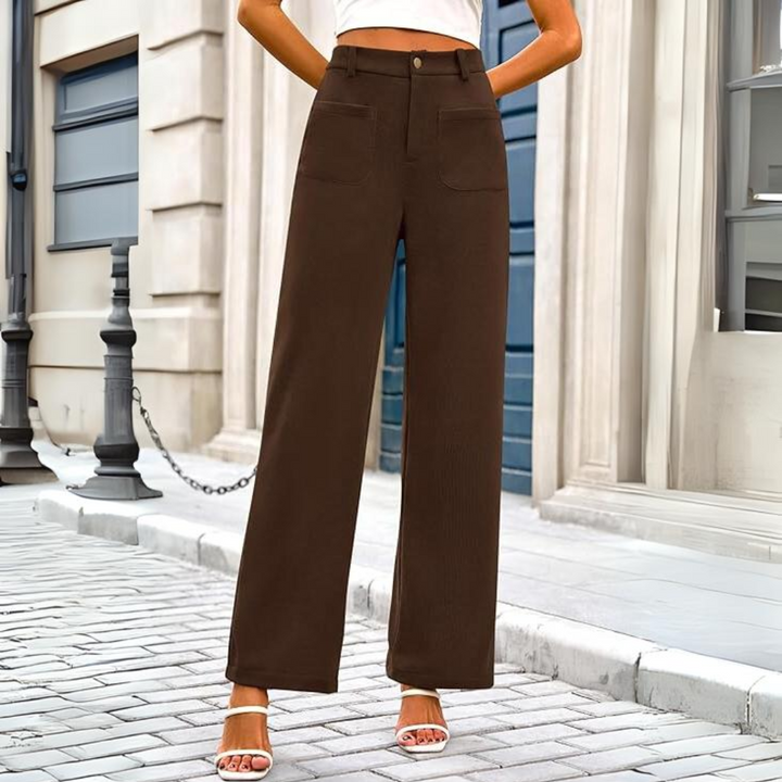 Model wearing comfortable women's wide leg palazzo pants with a high waist, in a studio shot, full length