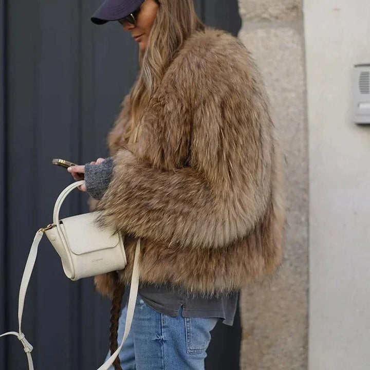 Effortless elegance: Clarisse women's luxe plush fur coat. A warm, long winter jacket & luxury fashion piece.