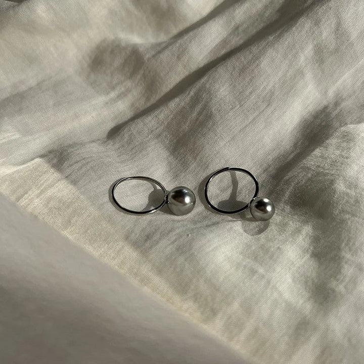 Classic adjustable pearl ring featuring a freshwater pearl on sterling silver band for women.