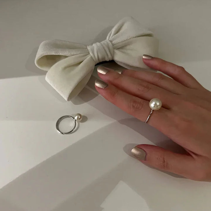 Sterling silver adjustable pearl ring for women, a timeless and classic freshwater pearl design.