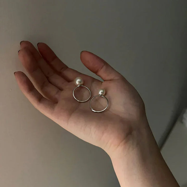 Gift for her: classic adjustable pearl ring with a freshwater pearl set in sterling silver.