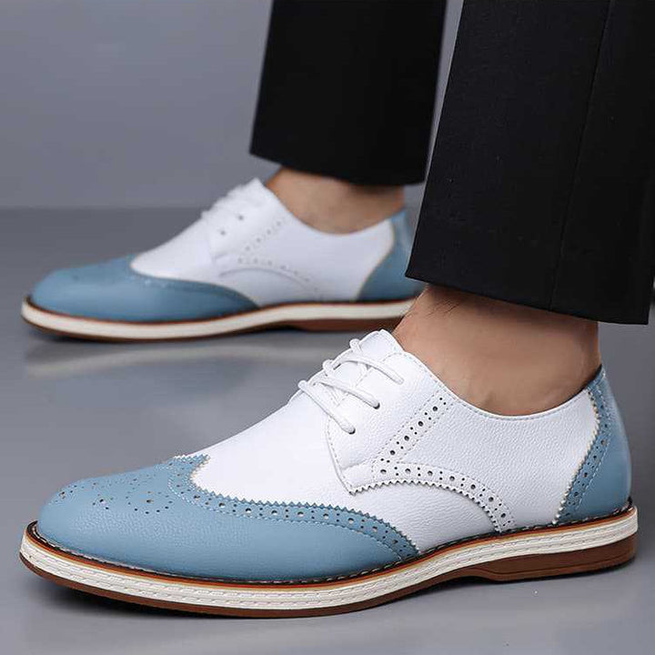 Top-down view of men's classic brogue dress shoes. Showcasing quality craftsmanship and timeless design.